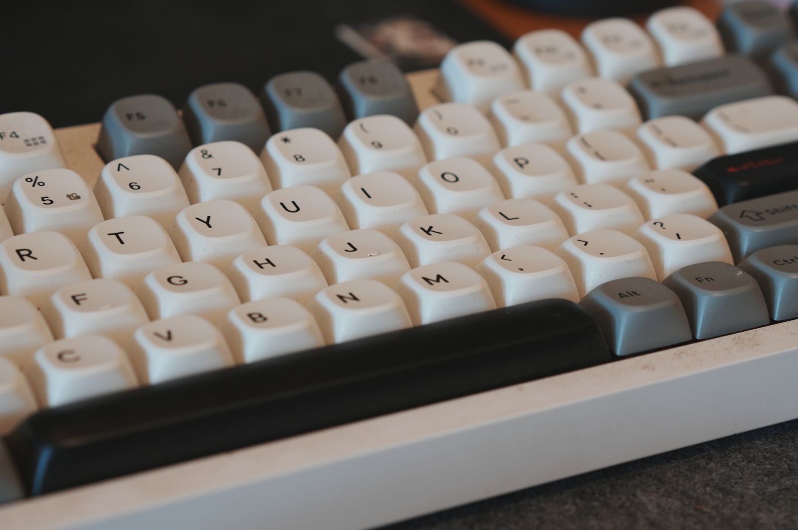 Close-up of white and grey keycaps